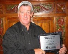 ICF Prostore owner John Maguire received the Reward Wall Outstanding Residential Award for 2005
